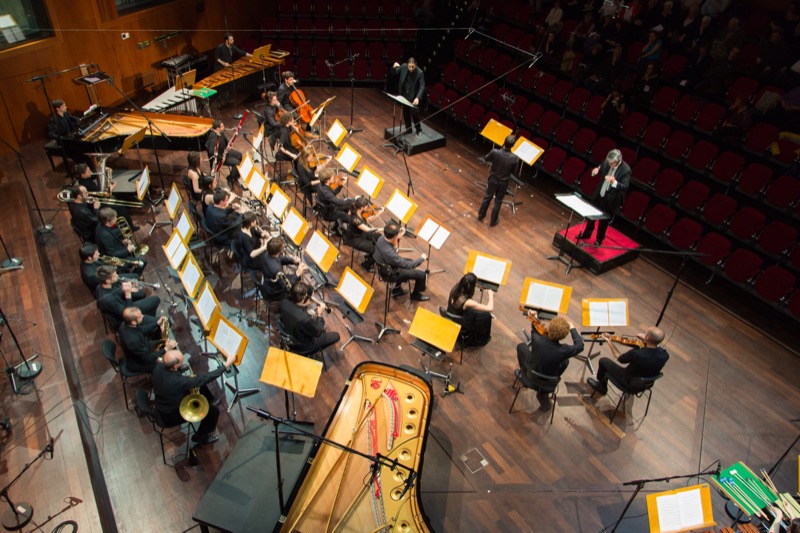 Francesco Bossaglia on the podium alongside conductor Arturo Tamayo, Lugano.